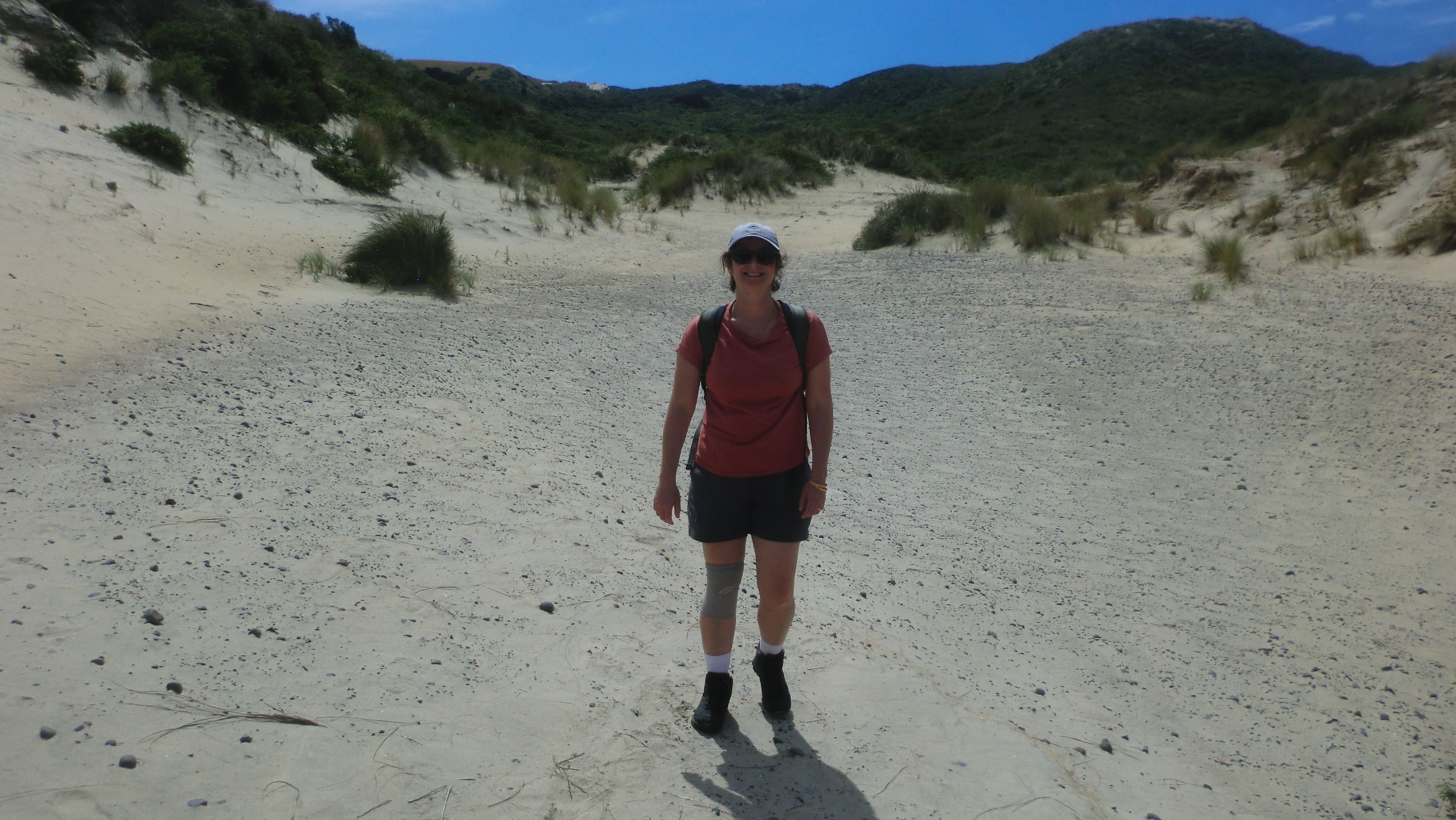 Saira in the little sandy canyon.